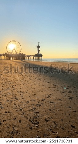 Similar – Image, Stock Photo Scheveningen beach in the evening with a view of the lighthouse and Ferris wheel