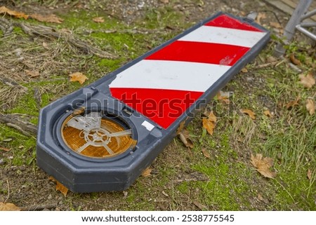 Similar – Image, Stock Photo red-white barrier beacons in front of a richly decorated but slowly decaying residential house with yellow-brown clinker facade from the Gründerzeit / dilapidated / lost place