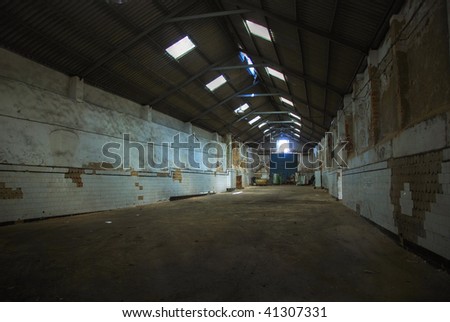 Deserted factory - Abandoned empty warehouse.