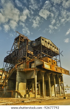 old mine shaft building with tower - Algaida well Winch, Department of Internal mina (Malacate pozo Algaida) Huelva, Spain