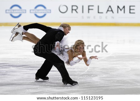 ESPOO, FINLAND - OCT 7:Lesia Volodenkova and Vitaly Vakunov compete in ice dancing free dance figure skating at the Finlandia Trophy Espoo 2012 on Oct 7,2012 at the Barona Arena in Espoo,Finland.