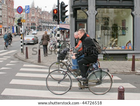 AMSTERDAM, NETHERLANDS - APRIL 9: Biking is by far the best way to get around Amsterdam, nearly half of all traffic movements in Amsterdam are by bike, on April 9, 2009 in Amsterdam, Netherlands.