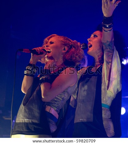 HELSINKI, FINLAND - AUGUST 26: Finnish pop rock band PMMP fronted by singers Paula Vesala and Mira Luoti  live on stage at Tavastia,Club-#1 rock venue in Finland on August 26,2010 in Helsinki, Finland