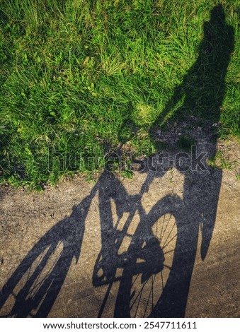 Similar – Image, Stock Photo shadow of cyclist taking photo