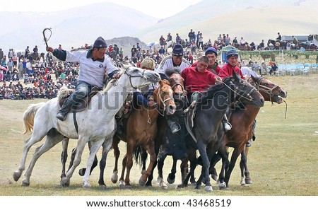 KYRGYZSTAN - JULY 21: Polo teams from Naryn and Osh battle it out in the final at the Central Asian Horse Games on July 21, 2009 in Kyrgyzstan
