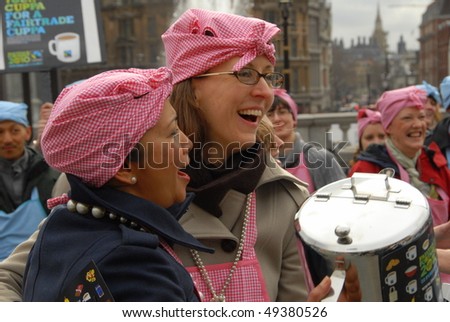 WESTMINSTER, LONDON - FEBRUARY 25: Fair trade campaigners dressed as tea ladies protest outside the National Gallery on February 25, 2010 in Trafalgar Square, London