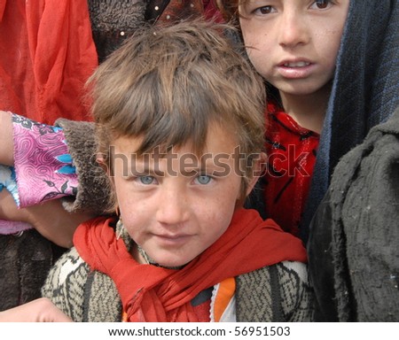 Nechem, Afghanistan - May 28: Green Eyed Child Poses For The Camera On ...