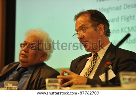 LONDON - OCT 25: Labour Lord Desai and Conservative Lord Flight engage in debate on October 25, 2011 at CBS, London. They agree on the need to deregulate UK business to make it competitive.