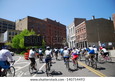 NEW YORK, NY - MAY 5: Bikers ride in Brooklyn during the 2013 TD 5 Boro Bike Tour on May 5th, 2013 in New York, New York.