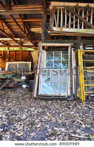 old doors and windows in a junk pile