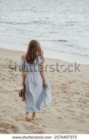 Similar – Image, Stock Photo Woman holding her hat wearing a bikini