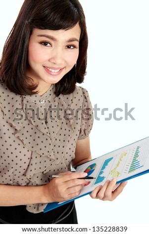 happy businesswoman working with corporate annual report