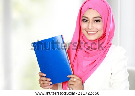 portrait of attractive young female asian student