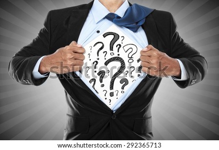 Businessman showing what is in his heart. he is questioning everything. conceptual image of man with curiousity
