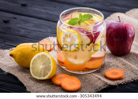 Summer fresh fruit Flavored infused water of apple, lemon, and carrot