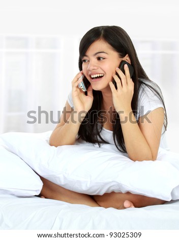 busy woman having two call on phone. busy concept