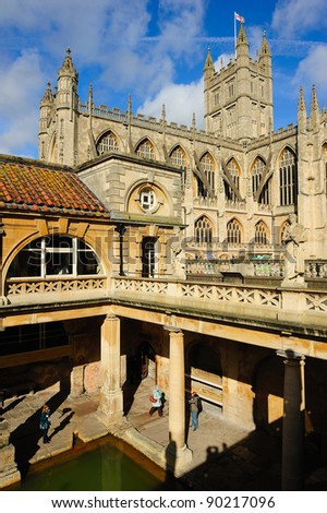 CITY OF BATH, ENGLAND - MARCH 9: Tourists at the ancient Roman Bath Museum, West England, March 9, 2011. The Baths are a major tourist attraction and receive more than one million visitors a year.