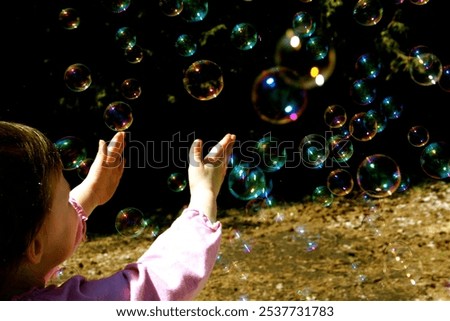 Similar – Image, Stock Photo a small child reaches for a strawberry