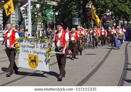 ZURICH - AUGUST 1: Swiss National Day parade on August 1, 2012 in Zurich, Switzerland. Representative of Toggenburg (canton Appenzeller) in a historical costume.