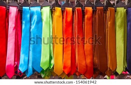 Shelf full of fine silk neckties on a Chinese street market