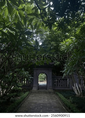 Similar – Image, Stock Photo Path through stone gate overgrown with ivy