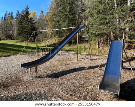 Image, Stock Photo metallic slide on the playgroundo on the street in Bilbao city Spain