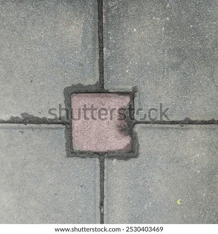 Similar – Image, Stock Photo Red bricks embedded in colorful cobblestones on a square in Bad Salzuflen near Herford in East Westphalia-Lippe, Germany