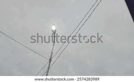 Similar – Image, Stock Photo metal lamp seen from below and white ceiling