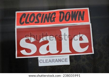 Closing Down Sign in Shop Window