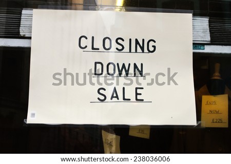 Closing Down Sign in Shop Window