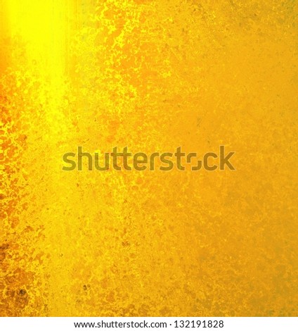 abstract gold background, fiery yellow and orange colors with sponge vintage grunge background texture, distressed rough smeary paint on wall, art canvas or board for brochure ad or website template