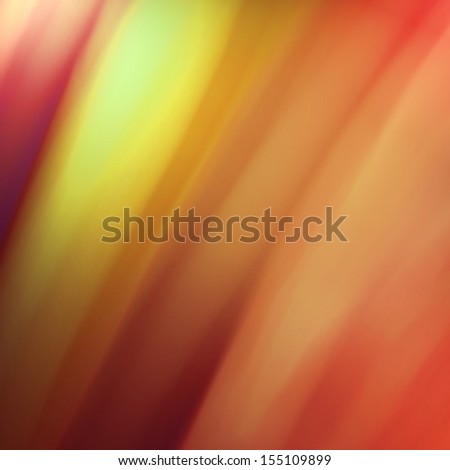 colorful warm background with abstract blurry soft stripes or yellow orange pink peach and red