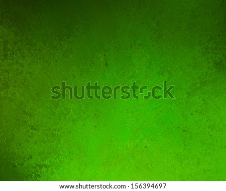 green background or green paper with bright spotlight on black background texture, for Christmas card or Christmas background or for St. Patrick\'s Day background, with vintage grunge texture