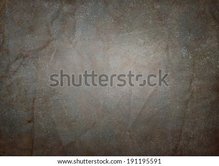 old vintage black background paper with crinkled worn border and faded white center light, aged distressed grunge texture style, monochrome gray background