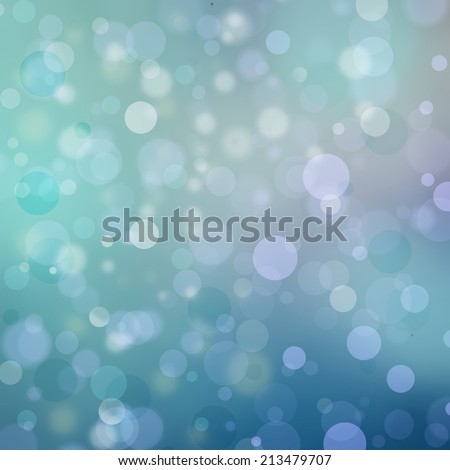 Beautiful teal blue bokeh background with shimmering colors and white lights, festive party background, magical glitter background sparkles