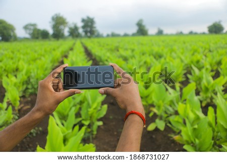 Similar – Foto Bild Handaufnahme einer Frau auf dem Feld