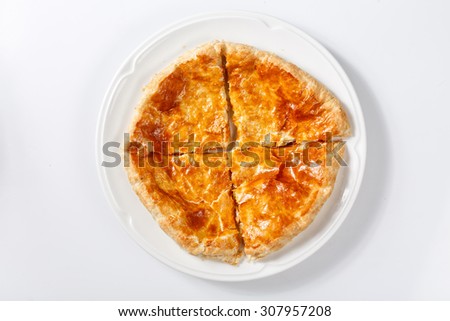 georgian traditional khachapuri on plate on white background. Asian national meal
