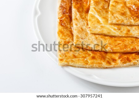 georgian traditional khachapuri on plate on white background. Asian national meal