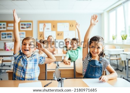 Similar – Image, Stock Photo Little concentrated girl with hairbuns is planting a flower in a flowerpot. Spring indoor activity. Caucasian ethnicity. Front view. Vertical shot. Selective focus