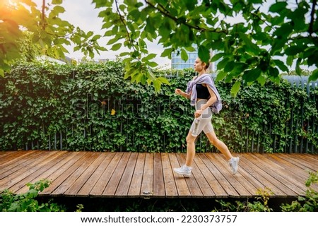 Similar – Image, Stock Photo Young and sportive woman portrait in a park