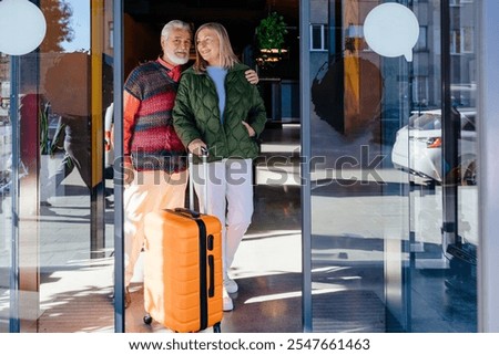 Similar – Image, Stock Photo Senior wanderer standing on hill in mountains