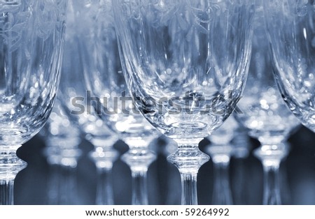 Rows of empty wine glasses in duo color version