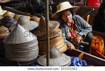 Thailand, Bangkok, Floating Market, Thai hats for sale on a boat