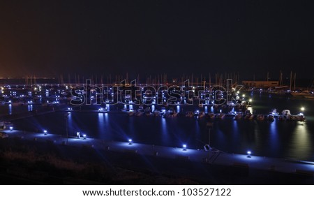 Italy, Sicily, Mediterranean sea, Marina di Ragusa, view of luxury yachts in the marina at night