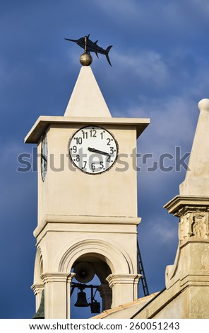 Italy, Sicily, Portopalo di Capopassero, view of the church\'s bell tower, swordfishing industry here is so important that a metal swordfish was put on the top, instead of a cross