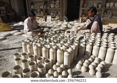 INDIA, Rajasthan, Jaipur; 25 january 2007, men working in a ceramics factory - EDITORIAL