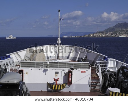 Italy, Sicily channel, view of the calabria coast on the right, on board of one of the many ferryboats that connect Sicily to the italian peninsula crossing the channel