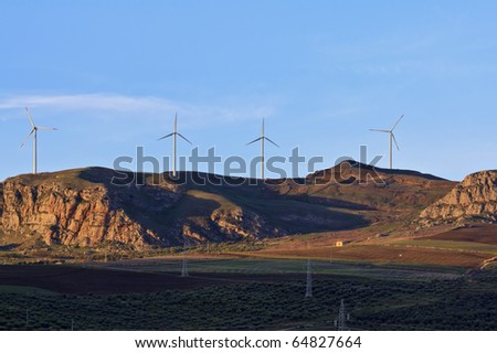 ITALY, Sicily, Sicani mounts, Eolic energy turbines and high voltage cables