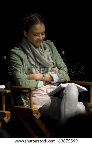 AUSTIN,TX - OCTOBER 24: Smiling Actress Jessica Alba reads \' The Hand Job \' Script at the Rollins Theatre during the 17th Annual Austin Film Festival on October 24, 2010 in Austin, TX.