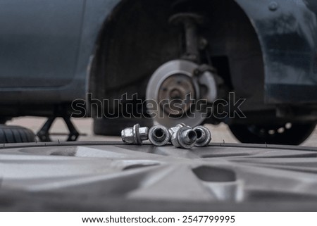 Similar – Image, Stock Photo car wheel lies on the side of the road covered with a thick layer of snow